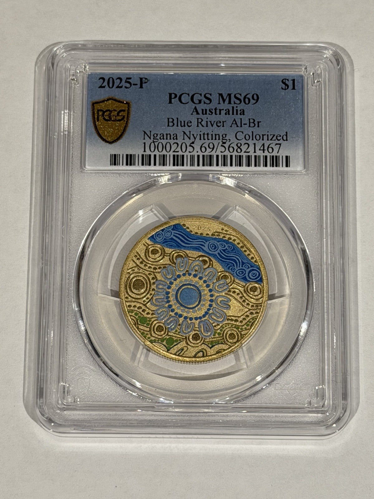 2025-P $1 One Dollar Ngana Nyitting Blue River PCGS Graded MS69 Coloured Coin