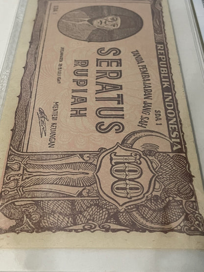 Indonesia Uang Kuno 100 Rupiah 1947 ORI III PCGS 64 Choice UNC Soekarno Banknote