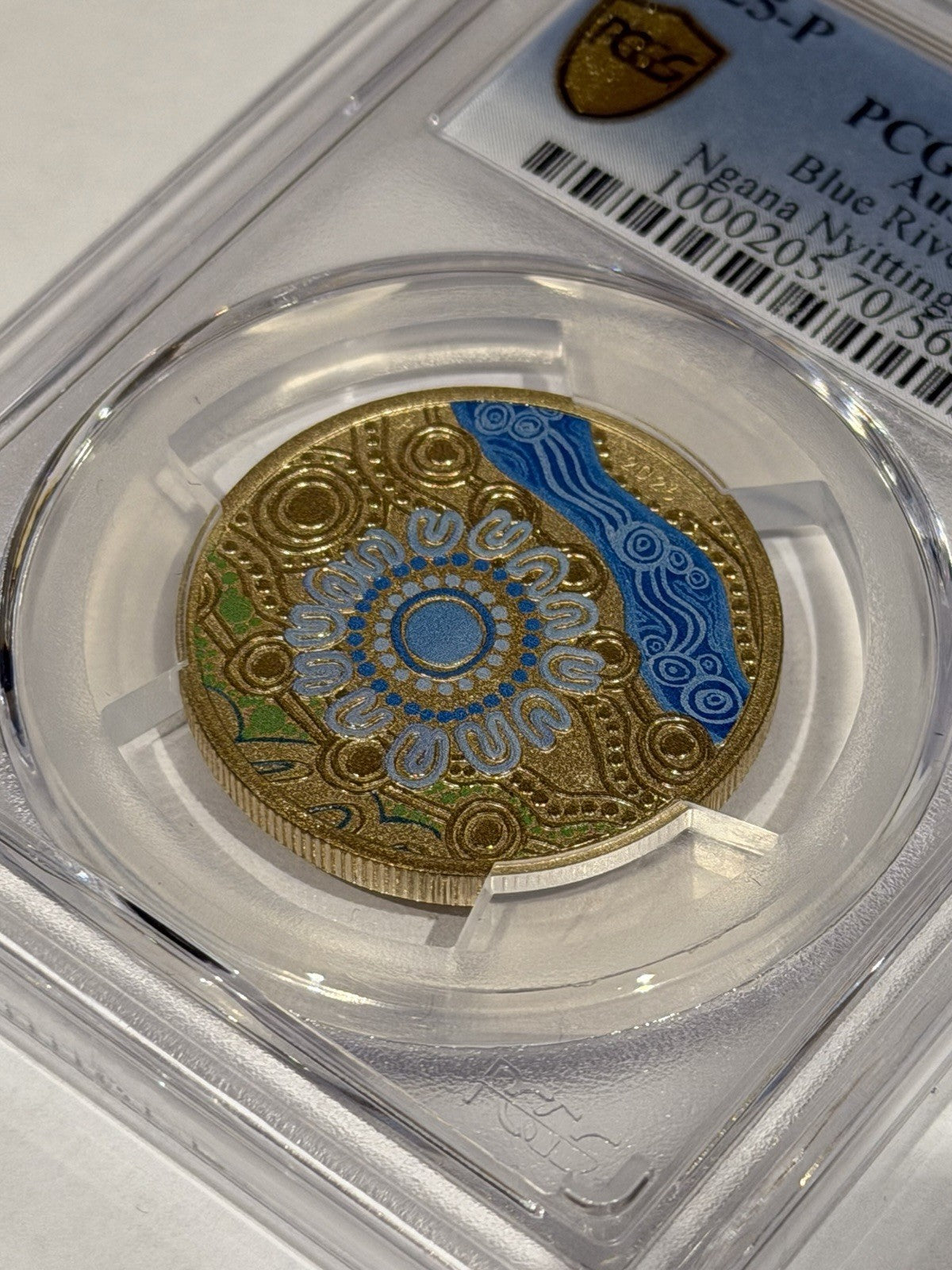 2025-P $1 One Dollar Ngana Nyitting Blue River PCGS Graded MS70 Coloured Coin