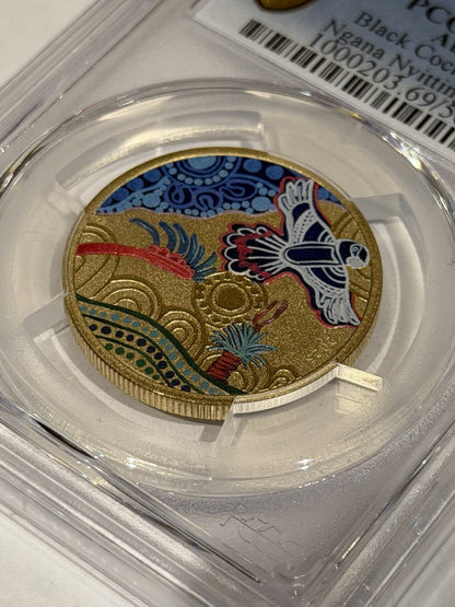 2025-P $1 Ngana Nyitting Black Cockatoo PCGS Graded MS69 Coloured Coin