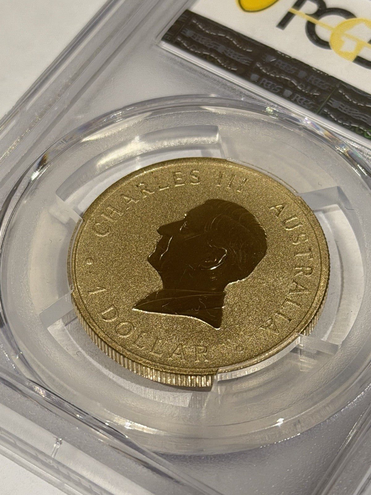 2025-P $1 One Dollar Ngana Nyitting Green Emu PCGS Graded MS69 Coloured Coin