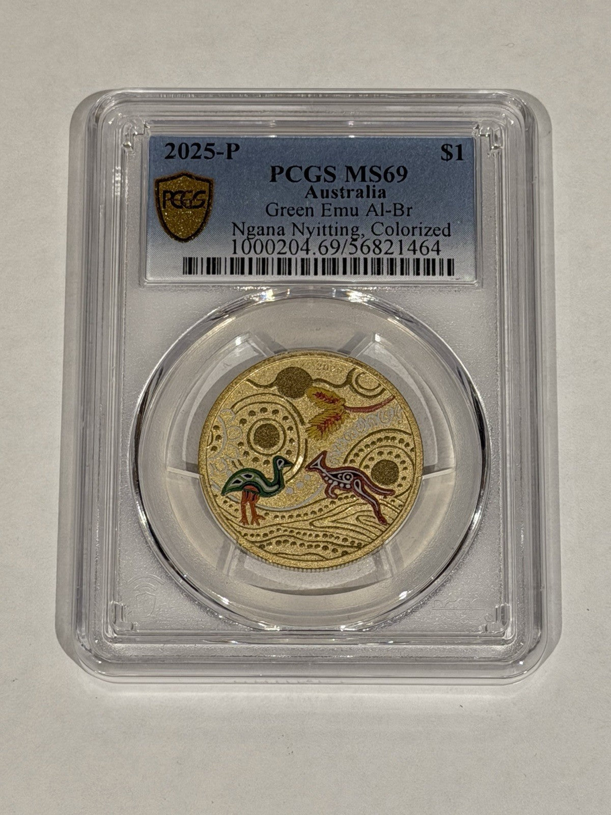 2025-P $1 One Dollar Ngana Nyitting Green Emu PCGS Graded MS69 Coloured Coin